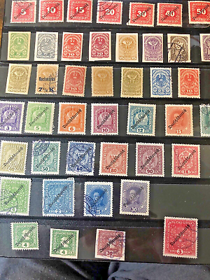 #ad 1908 20 AUSTRIA LOT ON CUT ALBUM PAGES APPROX 77 STAMPS MOSTLY USED SOME MINT