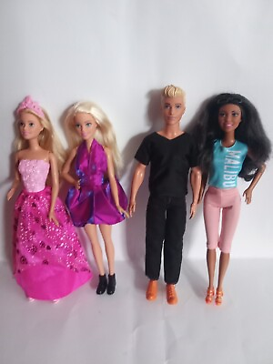 #ad 3 female fashion barbie dolls and one male barbie doll