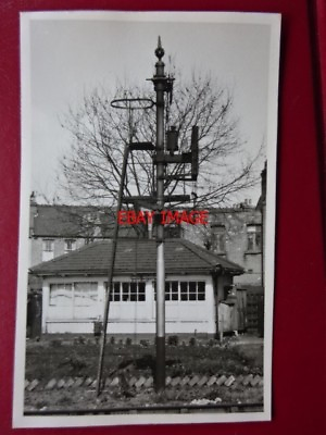 PHOTO WEST EALING SIGNAL IN FRON OF OLD SIGNAL BOX