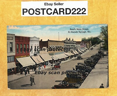#ad MO El Dorado Springs 1920 postcard BUILDINGS amp; AUTOMOBILES ON MAIN ST MISSOURI
