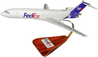#ad FedEx Federal Express Boeing 727 200F New Color Desk Top Model 1 100 SC Airplane